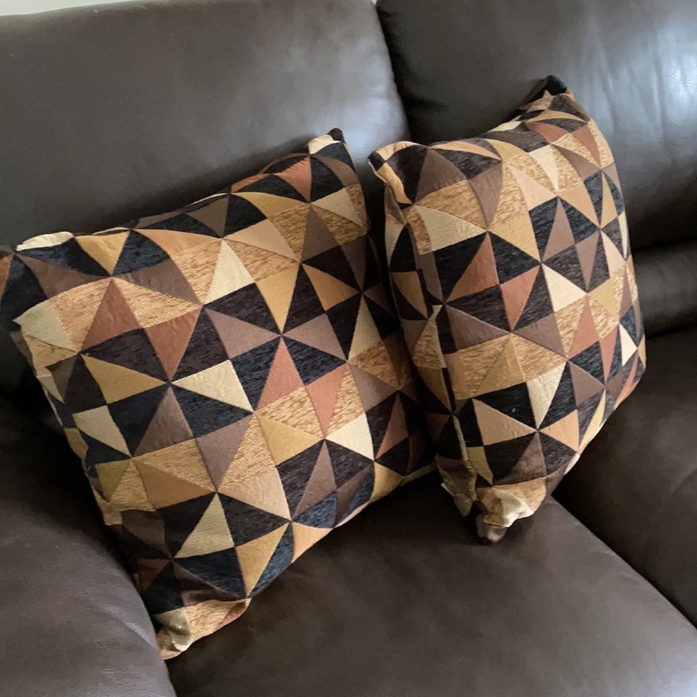 Set of Brown, Black, and Beige Couch Pillows